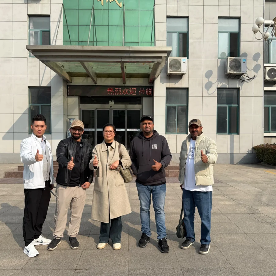 4U Business Links team with a manufacturer team outside their office